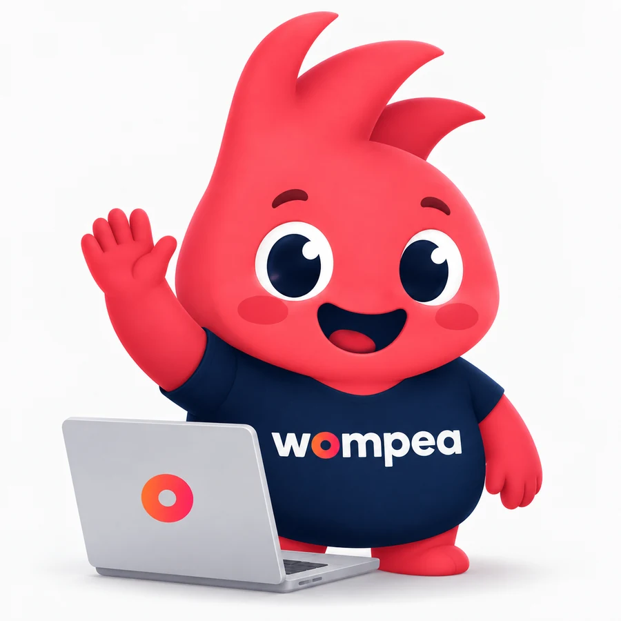 Peawom, mascota de Wompea, saludando junto a su computador